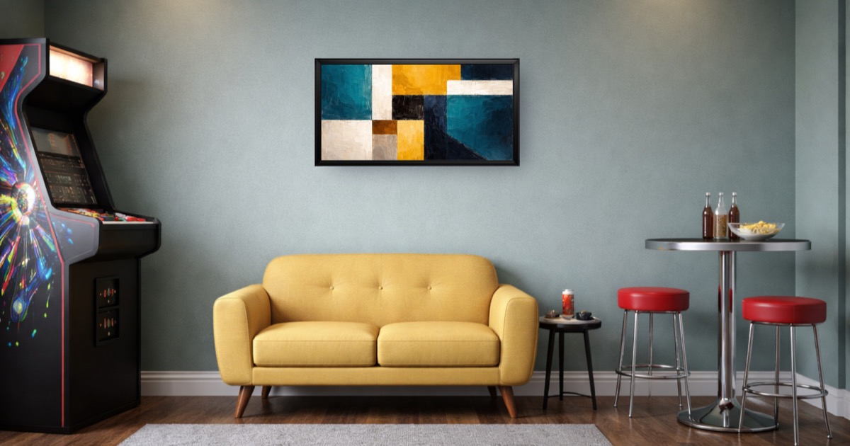 A gallery wall mockup showing multiple framed prints arranged above furniture in a balanced layout
